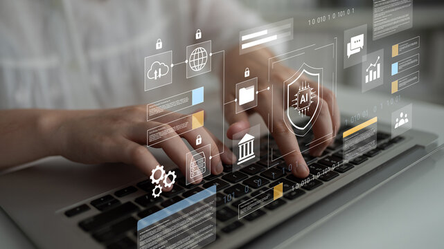 A person types on a laptop while engaging with an advanced digital interface that showcases icons related to data security and management, emphasizing modern technology use. Gantry