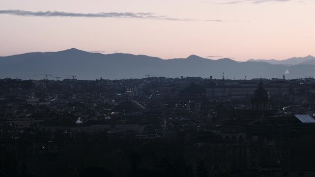 Rome winter skyline at sunrise from Gianicolo with Pantheon roof, Quirinale, and Montecitorio
