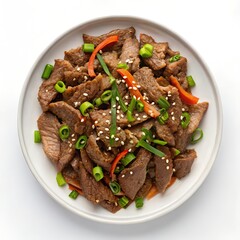 delicious beef dish with vegetables and sesame seeds on white plate white background