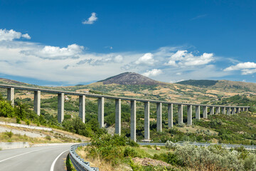 Fototapeta premium Italian viaduct spanning valley through Molise landscape