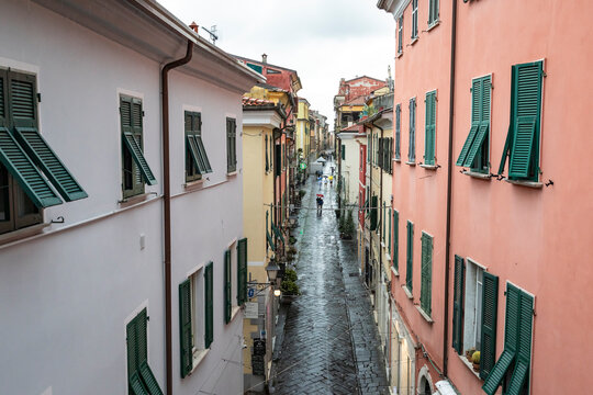 Via Mazzini cobbled street in Sarzana city, Province of La Spezia, Liguria, Italy