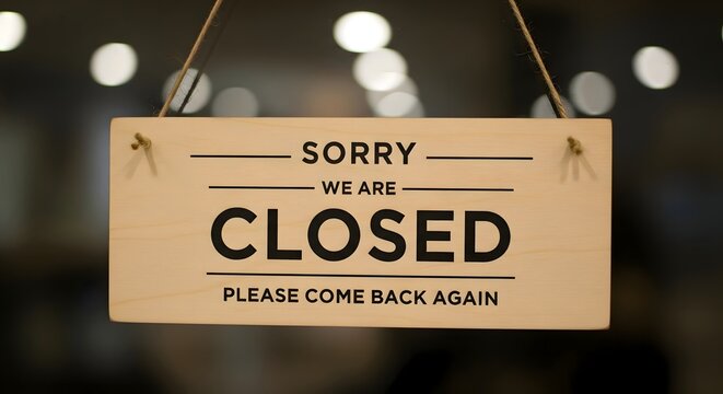 Closed sign business shop store door hanging notice sorry we are closed come back again message board