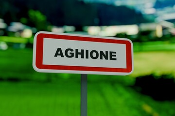 Aghione, city sign of Aghione. Entrance of the municipality of Aghione