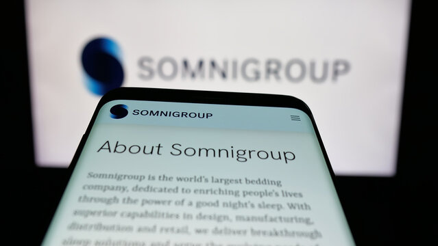 Stuttgart, Germany - 01-26-2026: Mobile phone with website of US company Somnigroup International Inc. on screen in front of logo. Focus on top-left of phone display.