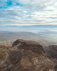 Masada, ruins of a mountain-top fortress in the Judaean Desert, western shore of the Dead Sea in the background, Southeastern Israel world heritage site