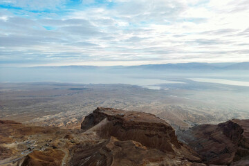 Masada, ruins of a mountain-top fortress in the Judaean Desert, western shore of the Dead Sea in the background, Southeastern Israel world heritage site