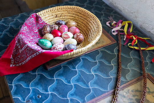 Traditional Czech Easter eggs and pomlazka in basket