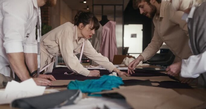 Participants immerse themselves in a lively design workshop, crafting unique clothing in a creative atmosphere