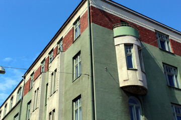 Obraz premium Art Deco Residential Building Corner With Green Facade