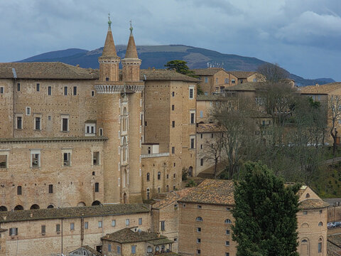 Urbino's Ducal Palace in the Marche region, Italy is an architectural gem of the Renaissance, known for its unique twin towers (Torricini) and housing the National Gallery of the Marche