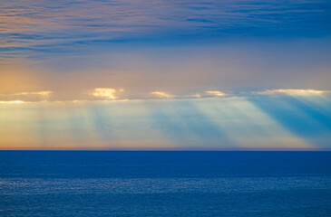 Shafts of Dark and Light Over a Stormy Lake