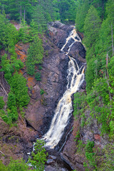 River Cascading Down Jagged Rocks in the Forest