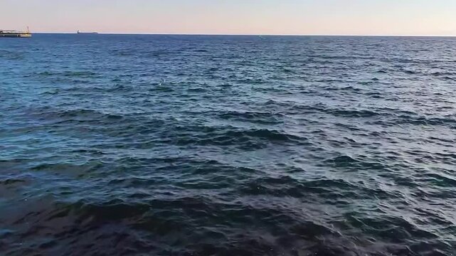 Group of Seagulls Flying Over Blue Wavy Sea Surface at Tekirdag Coastline, Marmara Sea, Turkey - Cinematic View of Marine Birds and Ocean Ripples in Calm Weather