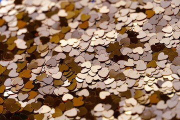 Heap small many shape of hearts paper pastel color. Valentine day close-up background with bokeh.
