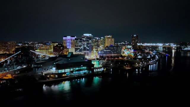 Aerial drone view of downtown Norfolk skyline at night, Virginia