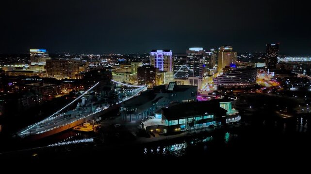Aerial drone view of downtown Norfolk skyline at night, Virginia