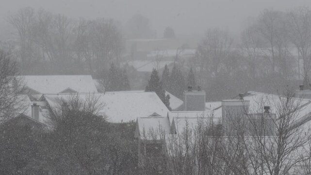 Winter Storm Gianna in Greenville, South Carolina. Strong Snow Blizzard in Winter, Greenville, South Carolina. Blizzard Strong Wind And Heavy Snow Lash Town. Heavy Snowstorm in Residential Area.