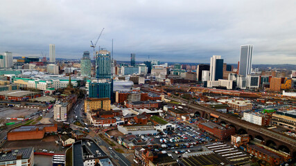 Naklejka premium Aerial view of Birmingham city skyline with modern skyscrapers and construction