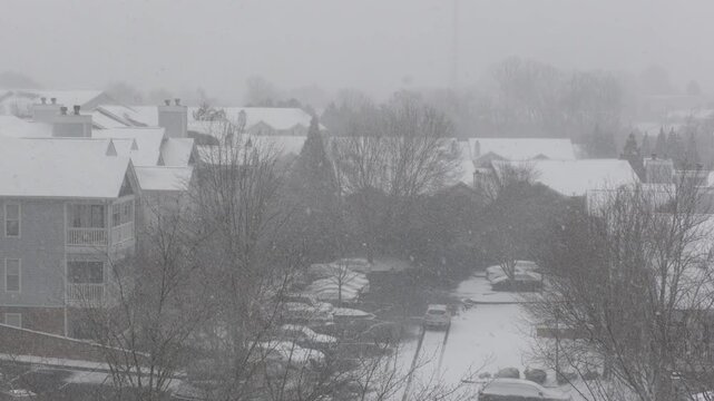 Winter Storm Gianna in Greenville, South Carolina. Strong Snow Blizzard in Winter, Greenville, South Carolina. Blizzard Strong Wind And Heavy Snow Lash Town. Heavy Snowstorm in Residential Area.