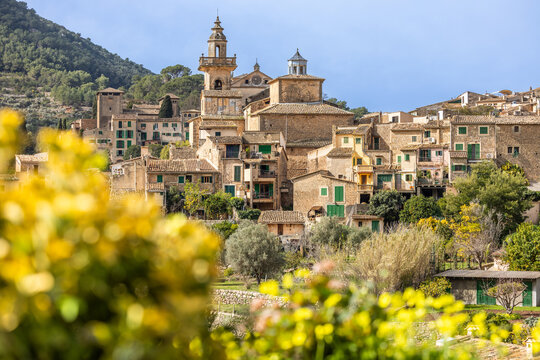 Panoramic view of the mountain village of Valldemossa with church Sant Bartomeu in Serra de Tramuntana mountains, Mallorca, Balearic Islands, Spain