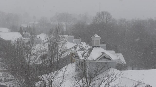 Winter Storm Gianna in Greenville, South Carolina. Strong Snow Blizzard in Winter, Greenville, South Carolina. Blizzard Strong Wind And Heavy Snow Lash Town. Heavy Snowstorm in Residential Area.