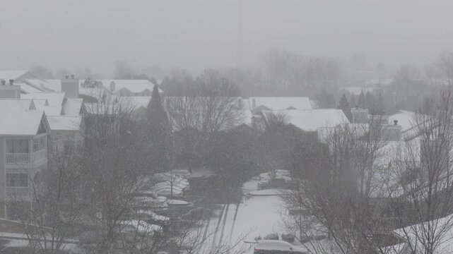 Winter Storm Gianna in Greenville, South Carolina. Strong Snow Blizzard in Winter, Greenville, South Carolina. Blizzard Strong Wind And Heavy Snow Lash Town. Heavy Snowstorm in Residential Area.