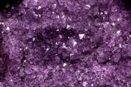Amethyst druzy crystal surface sparkling in macro close detail