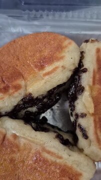 This is pukis cake, a traditional Indonesian cake originating from Banyumas, Central Java. It's made from a mixture of wheat flour, eggs, sugar, coconut milk, and yeast.