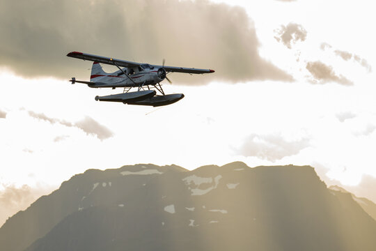 Alaskan Float Plane Takes Off for Adventure at Dawn