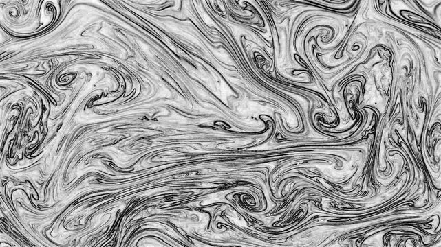 A refined grayscale paint surface with gentle tonal transitions and texture depth, suitable for editorial layouts and contemporary design.