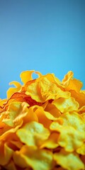 Golden potato chips piled high, an irresistible crispy indulgence,  yellow,  thin
