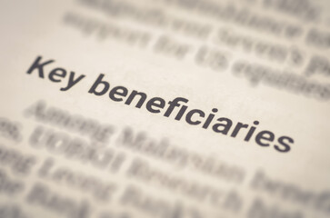 Document Highlighting 'Key Beneficiaries' Phrase Emphasizing Financial or Legal Recipient Identification