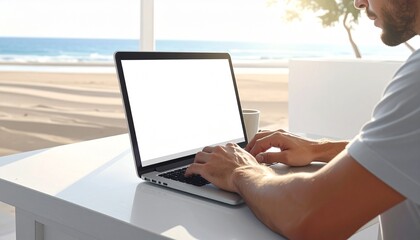"Person typing on laptop with blank white screen, coffee cup and plant on desk, minimalist workspace near window symbolizing remote work and focus"