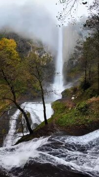 Misty Waterfall In  Autumn Forest Landscape