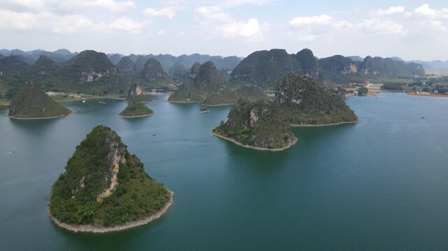 Karst Limestone Islands Orbit Aerial over Water Landscape China