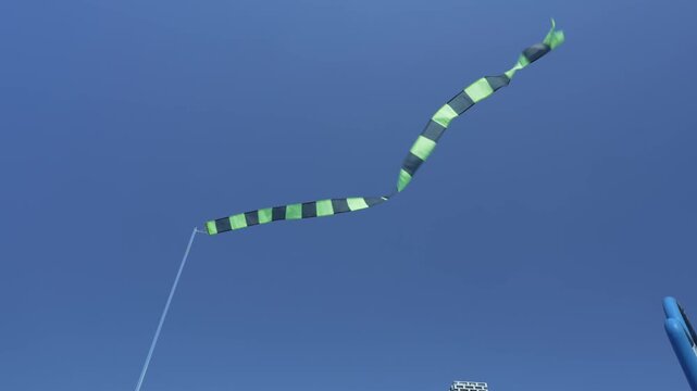 blue sky with clouds and sun with banners