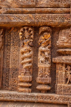This erotic stone sculpture at the Konark Sun Temple depicts an intimate couple in close embrace, symbolizing fertility, human desire, and tantric philosophy in Odishan temple art.
