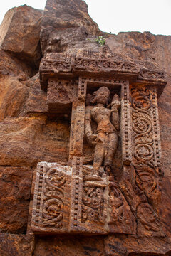 This erotic stone sculpture at the Konark Sun Temple depicts an intimate couple in close embrace, symbolizing fertility, human desire, and tantric philosophy in Odishan temple art.

