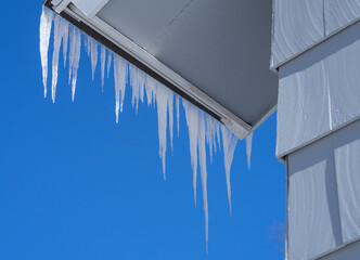 icicle hanging on house roof