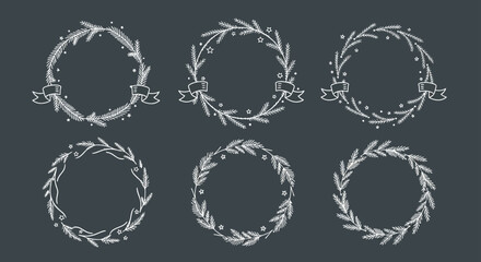 Obraz premium hand-drawn christmas and new year wreaths white line art on dark gray perfect for winter holiday cards invites and design.