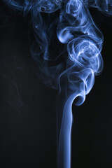 Abstract Smoke Art in blue against a dark background, with an elegant, swirling form that creates a sense of mystery and movement