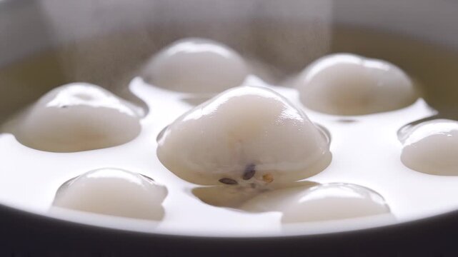 Idlis Steaming in a Cooker Closeup.