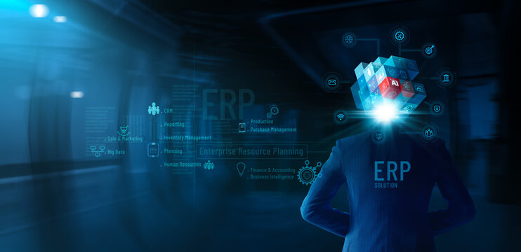 ERP Enterprise resources planning system software business technology with Abstract, Ai, creative concept. Digital cube with business icons on head businessman for data analysis and transformation.