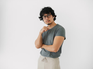 asian man contemplative businessperson with glasses considering strategies intensely, focused asian professional deeply analyzing innovative ideas isolated on white background