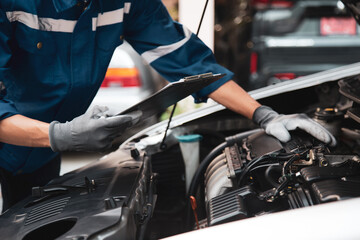 Obraz premium Auto mechanic and checklist for fix service repairing and car care maintenance servicing change spare part engine problem or insurance support or range of car check or training workshop.