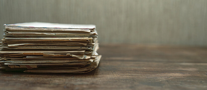 A stack of old letters on the table.Archive of secret documents.