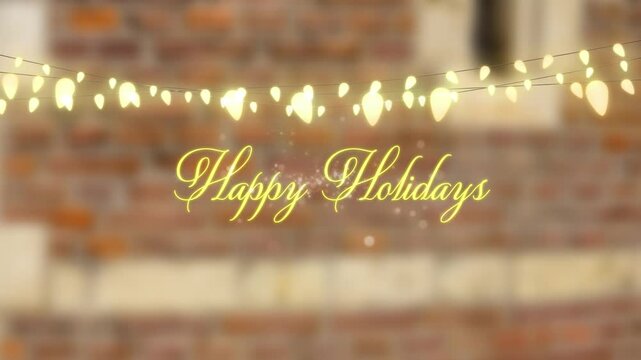 Animation of happy holidays text banner and hanging fairy lights against brick wall
