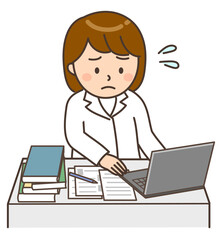 パソコンの前で困っているデスクワーク中の女性医師