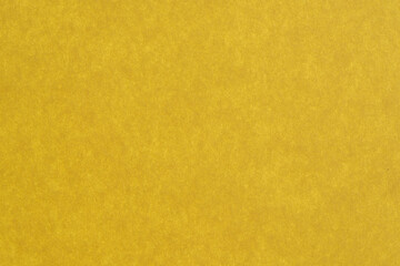 Obraz premium Vibrant yellow backdrop brings warmth and energy to any design