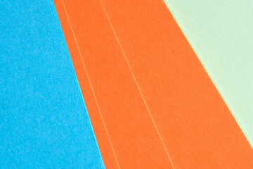 Colorful paper sheets arranged in playful layers and vibrant hues